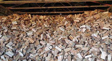 Pine-firewood-after-being-split-and-dried-and-stored-in-our-sheds-awaiting-delivery